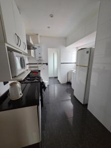 Gran departamento con parrilla y cochera en Playa Grande