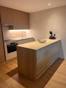 Appartement met zeezicht, zwembad & garage