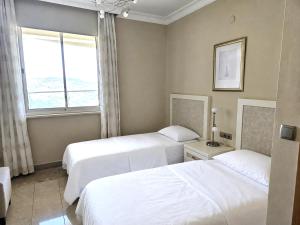 Luxury 2-Bedroom Sea View Apartment in Gold City