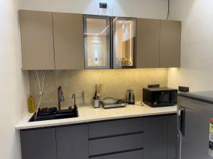 Cosmo Stays 10 Hour Studio near Gaur City Centre