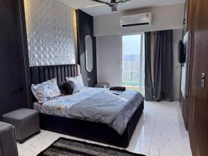 Cosmo Stays 10 Hour Studio near Gaur City Centre