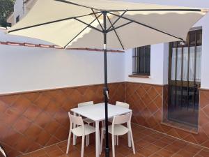 Vivienda adosada a 150m de la playa + patio + wifi