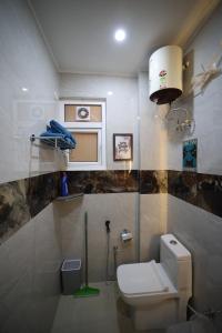 The Ivory Nest Stylish 2BHK Near Shastradhara