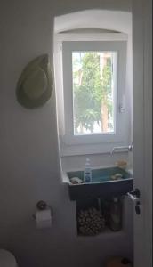 Artemonas traditional three bedroom house