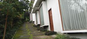 Townhouse Oak Hotel Pondokan Tjiburial