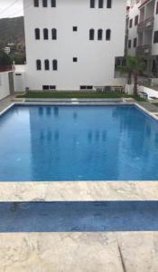 Poolside apartment with air conditioning