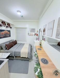 Cozy Studio near Araneta with SmartLock, Netflix, and WiFi