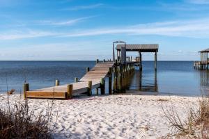 Pet-Friendly Cottage with Private Beach Access & Pier in Dauphin Island, Alabama