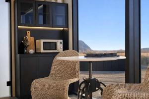 Scandinavian-Inspired Desert Retreat with Mirrored Views | Near Torrey, Utah