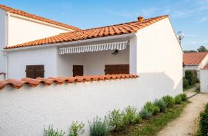 Maison charmante aux Mathes avec jardin clôturé.