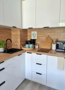Apartament Harmonia z basenem by Holiday Park & Apartments, Ku Morzu