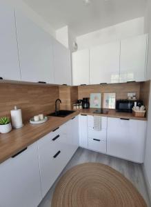 Apartament Harmonia z basenem by Holiday Park & Apartments, Ku Morzu