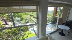 Apartment with Pool, Gym & AC.