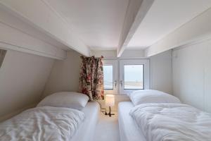 Welcome in - Slaapstrandhuisje op het strand nr 126