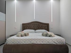-Garden Suite-5 min dal mare Wifi AC 4 posti letto