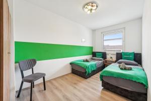 Livemore24 - Apartment 3 in Duisburg WLAN - Smart-TV - 24-7 Check-in und Küche