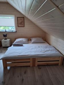 Domek Viking z prywatnym ogrzewanym basenem sauną oraz balią z jacuzzi