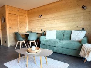 Studio chaleureux au coeur des Carroz