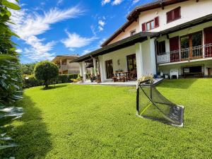 Villa dei Mumi by Lago Reisen