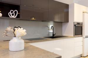 Island Breeze Oasis by Belmont Realty
