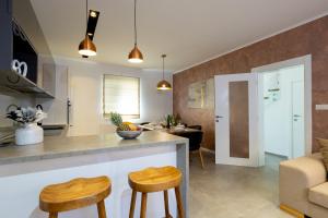 Island Breeze Oasis by Belmont Realty