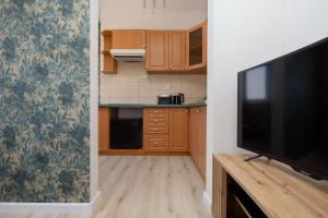 Compact Apartment Near the Underground by Noclegi Renters