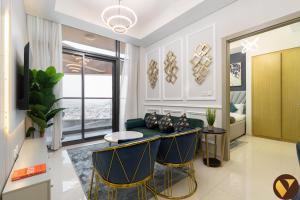 Vogue Vacation Homes, Business Bay Aykon City Tower Close to Downtown Burj Khalifa and Dubai Mall, Walkable Distance to Metro Station, Two Bedroom Apartment with Large Balcony and City View, Access toAmenities