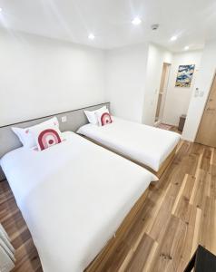 浅草花日美居 Asakusa Hanabi 303 Twin Bedroom 4 min walk to Senso-ji Temple Direct access to Narita Haneda Airport Hosts listings areat the same address