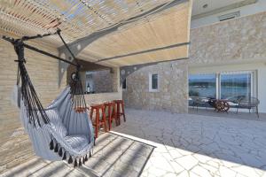 Villa Maritime - Exklusive Strandvilla mit beheiztem Pool, Grillhütte & Meerblick bei Zadar