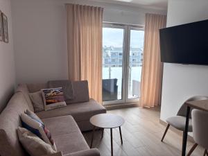 Nadmorski Relaks - komfortowy apartament blisko plaży w Sunset Resort