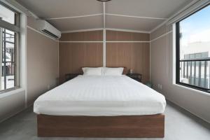 Newly Opened Nishiya Near Namba Nipponbashi and Tsutenkaku 3 Min Walk to Ebisucho Station Spacious Family Apartments 2 Bedroom for Up to 6 Guests and 3 Bedroom for Up to 7 Guests
