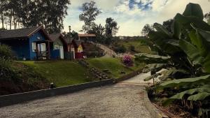 Chalé com lareira externa e vista para o Pico do Lopo