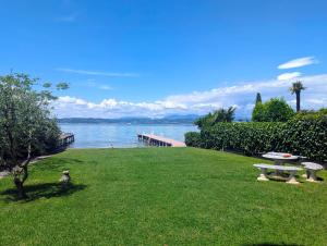 Trilocale Sporting con giardino privato e WiFi - Sunset Beach