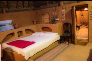 Aura Kalari Buddha Stone, Mud House & Tree House