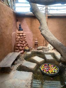 Aura Kalari Buddha Stone, Mud House & Tree House