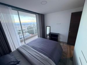 Amplio apartamento con vista a Quito - 2 parqueos