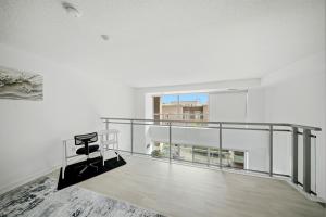 Downtown Loft style Condo with Pool Gym and Balcony