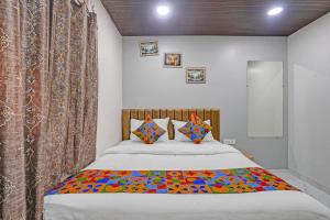 FabHotel Stay Land Plus