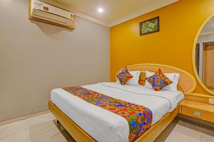 FabHotel Stay Land Plus