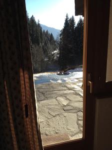 Ferienwohnung Laax mit Traumblick, großem Balkon und Terrasse