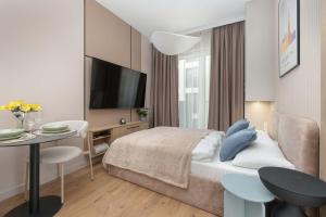 Beige Apartments By the River in Szczecin with Balconies by Noclegi Renters