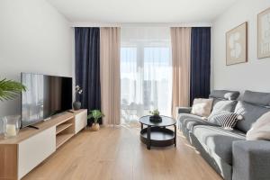 Stylish Apartment with Parking and Balcony by Noclegi Renters