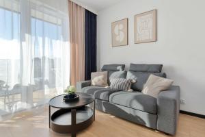 Stylish Apartment with Parking and Balcony by Noclegi Renters
