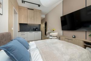 Beige Apartments By the River in Szczecin with Balconies by Noclegi Renters
