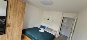 Słoneczny Apartament Panorama 5 7 z Widokiem na Jezioro i Góry