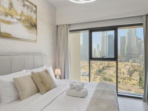 Magical Stay - Fountains & Burj View 2BR l 3 Beds