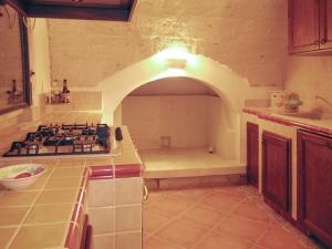 Comfortable House with Fenced Garden - Surano - Fireplace