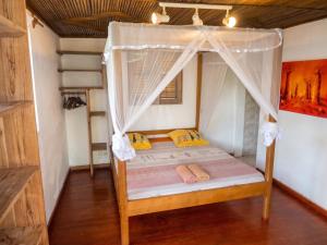 Charming bungalow in Andilana, pool, sea view and garden