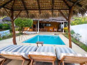 Charming bungalow in Andilana, pool, sea view and garden