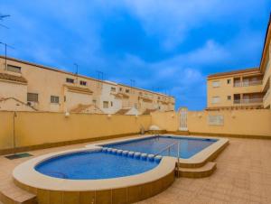 Lovely apartment with pool in Los Alcázares over 90 m²